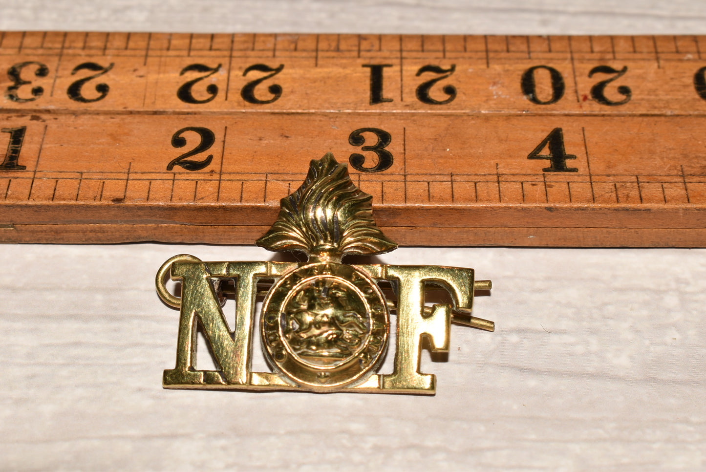 WW1 Northumberland Fusiliers Shoulder Title Badges - Original Brass Collection