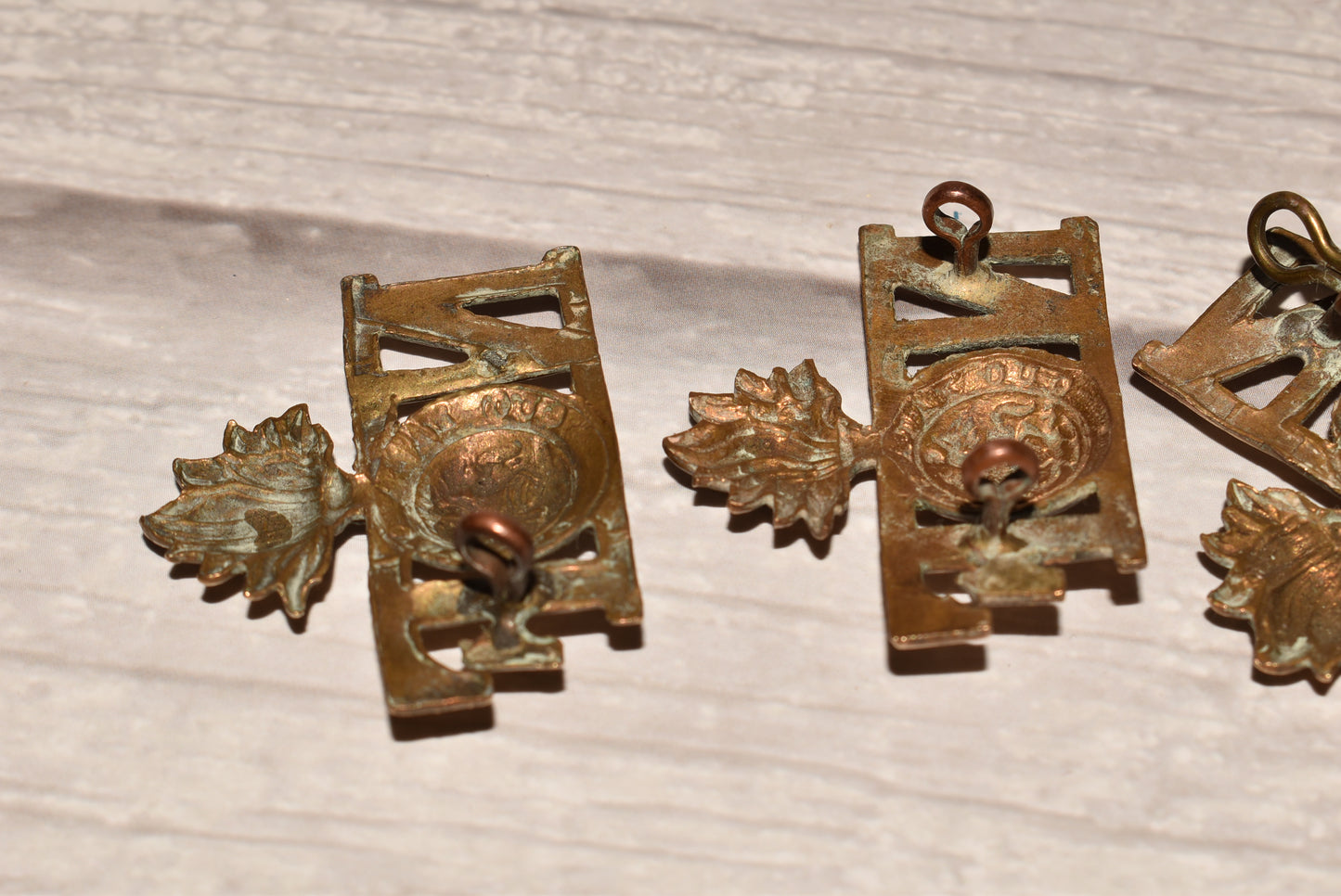 WW1 Northumberland Fusiliers Shoulder Title Badges - Original Brass Collection