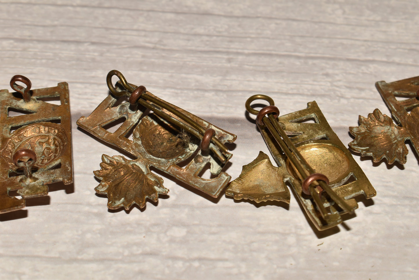 WW1 Northumberland Fusiliers Shoulder Title Badges - Original Brass Collection