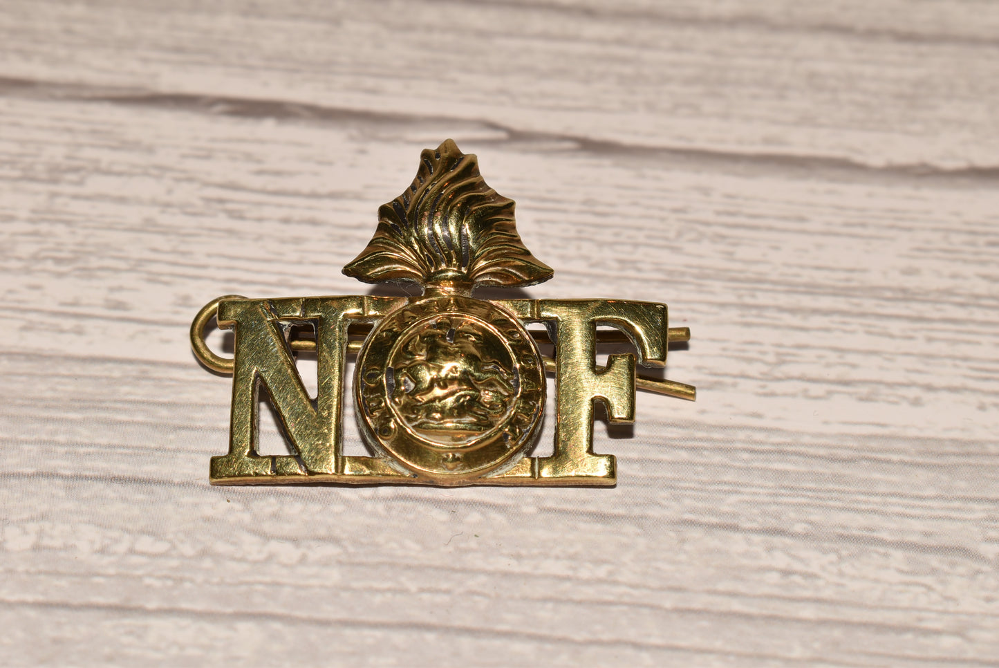 WW1 Northumberland Fusiliers Shoulder Title Badges - Original Brass Collection