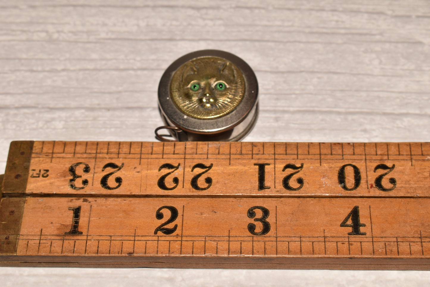 Antique Tape Measure with Cat Detail