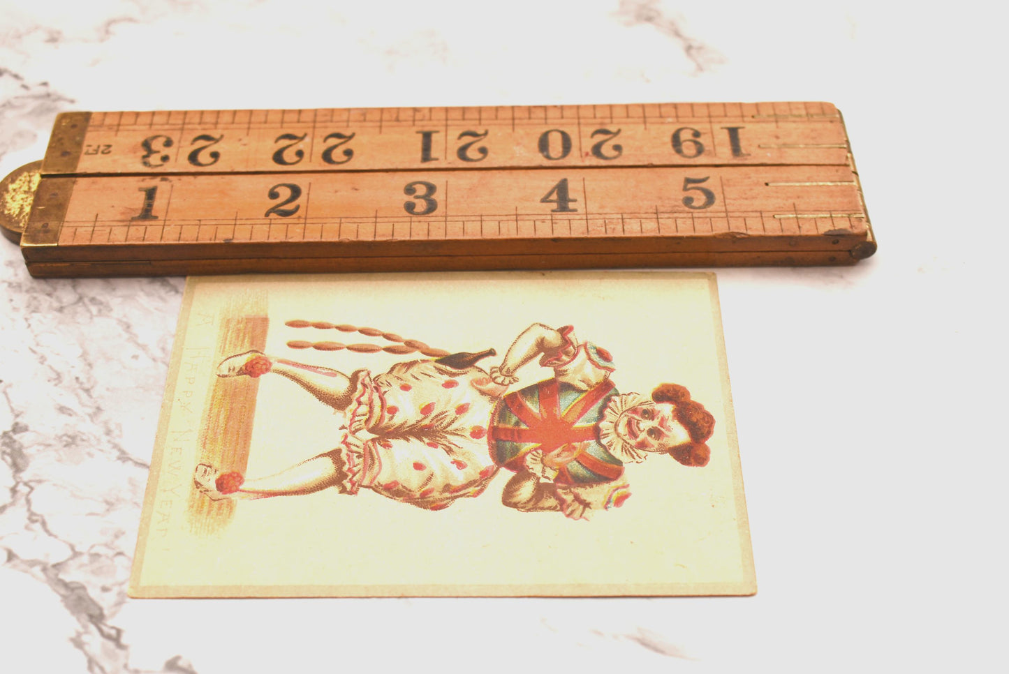 Antique Victorian New Year Card - Wonderful Macabre Scary Clown Stealing Drink and Sausages