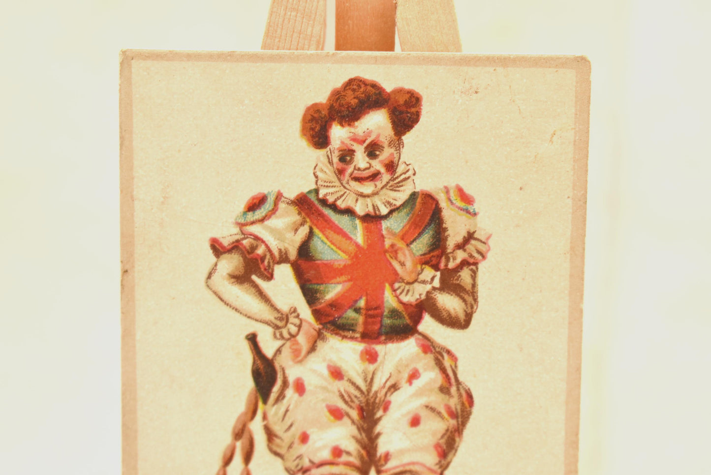 Antique Victorian New Year Card - Wonderful Macabre Scary Clown Stealing Drink and Sausages